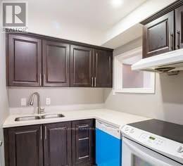 Upper - 27 Meadowland Drive, Brampton, ON - Indoor Photo Showing Kitchen With Double Sink