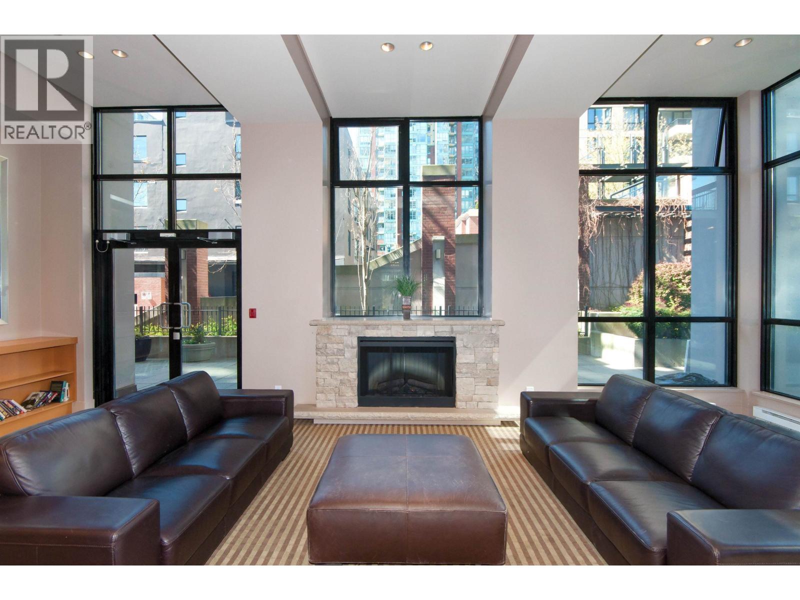 2201 977 Mainland Street, Vancouver, BC - Indoor Photo Showing Living Room With Fireplace