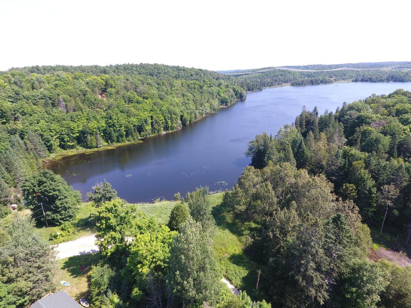 Access to a body of water - 36 Rue De L'Azur, Wentworth, QC - Outdoor With Body Of Water With View