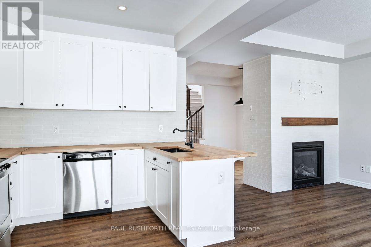 Kitchen - 123 Pictou Crescent, Ottawa, ON - Indoor Photo Showing Kitchen With Fireplace