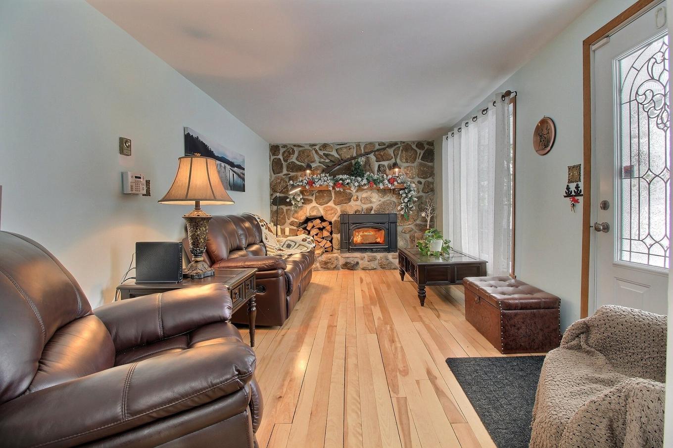 Living room - 2436 13E Rang, Orford, QC - Indoor Photo Showing Living Room With Fireplace