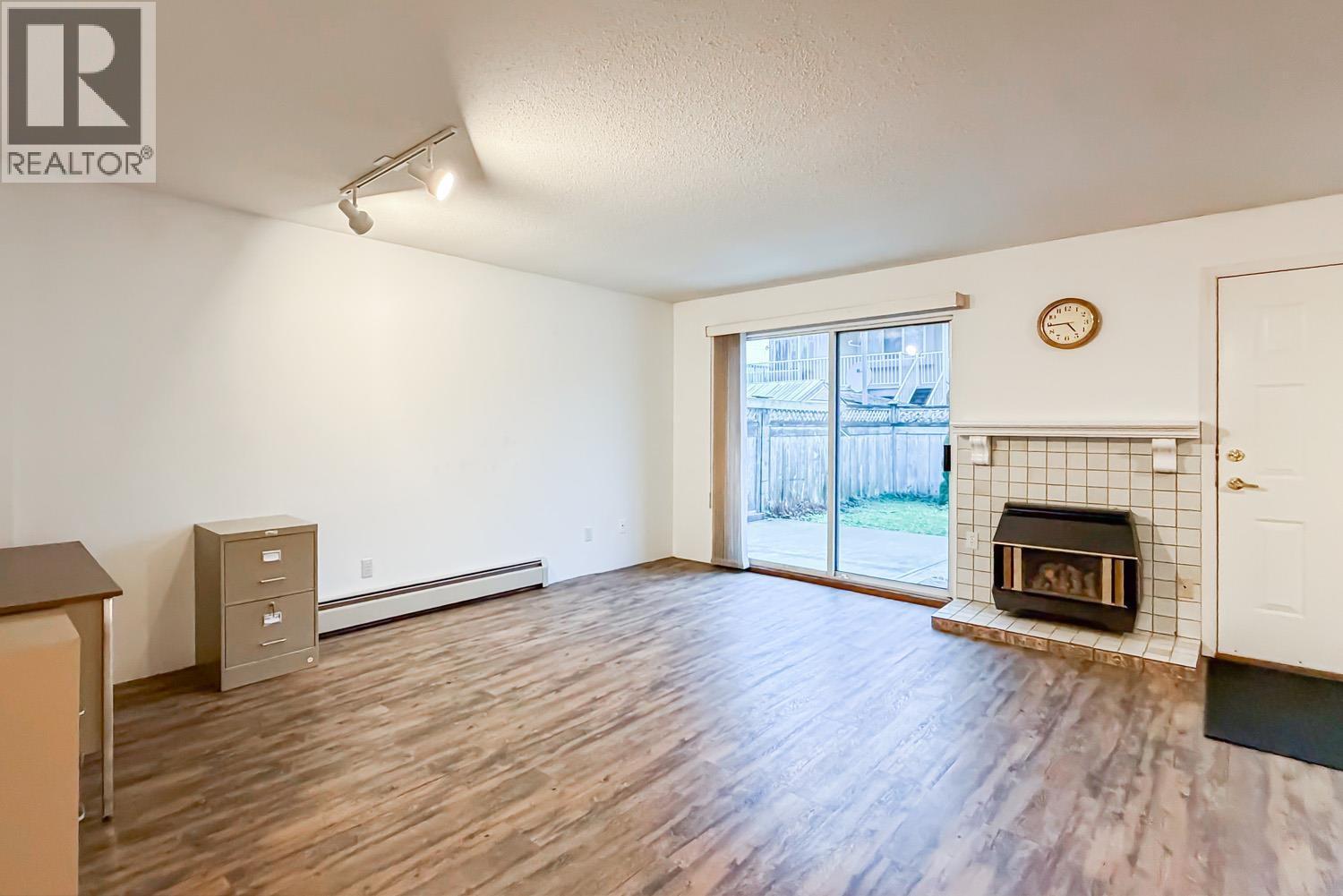 7459 Holly Street, Burnaby, BC - Indoor With Fireplace