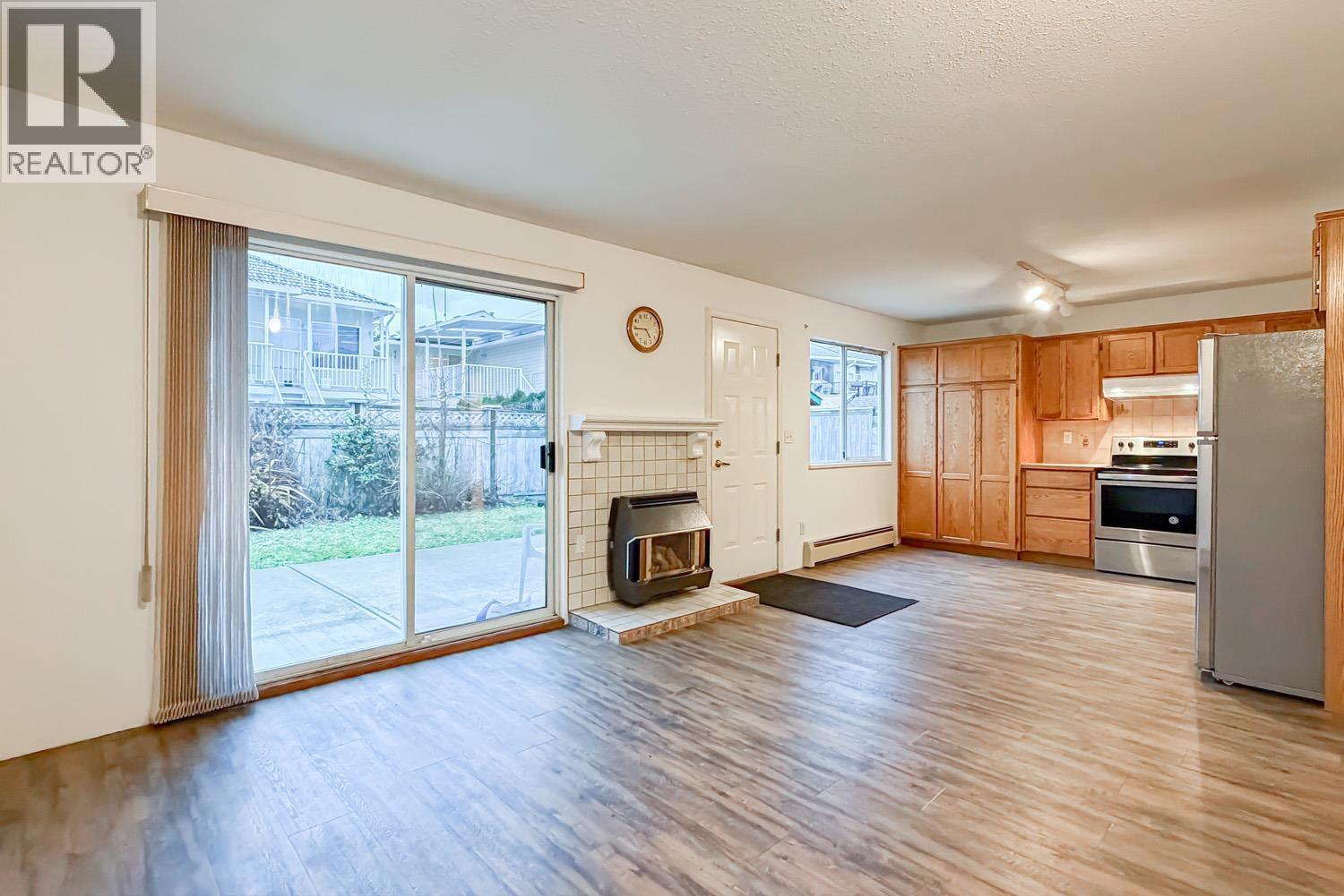 7459 Holly Street, Burnaby, BC - Indoor With Fireplace