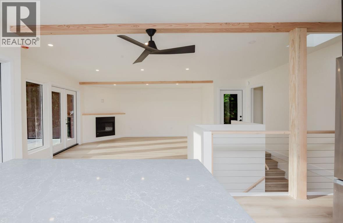 6960 Sunshine Coast Highway, Sechelt, BC - Indoor Photo Showing Other Room With Fireplace