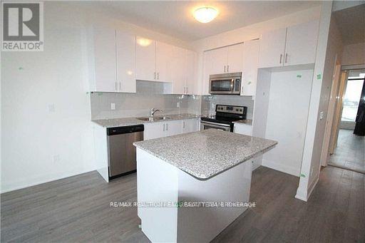 411 - 2900 Highway 7 Road, Vaughan, ON - Indoor Photo Showing Kitchen With Double Sink