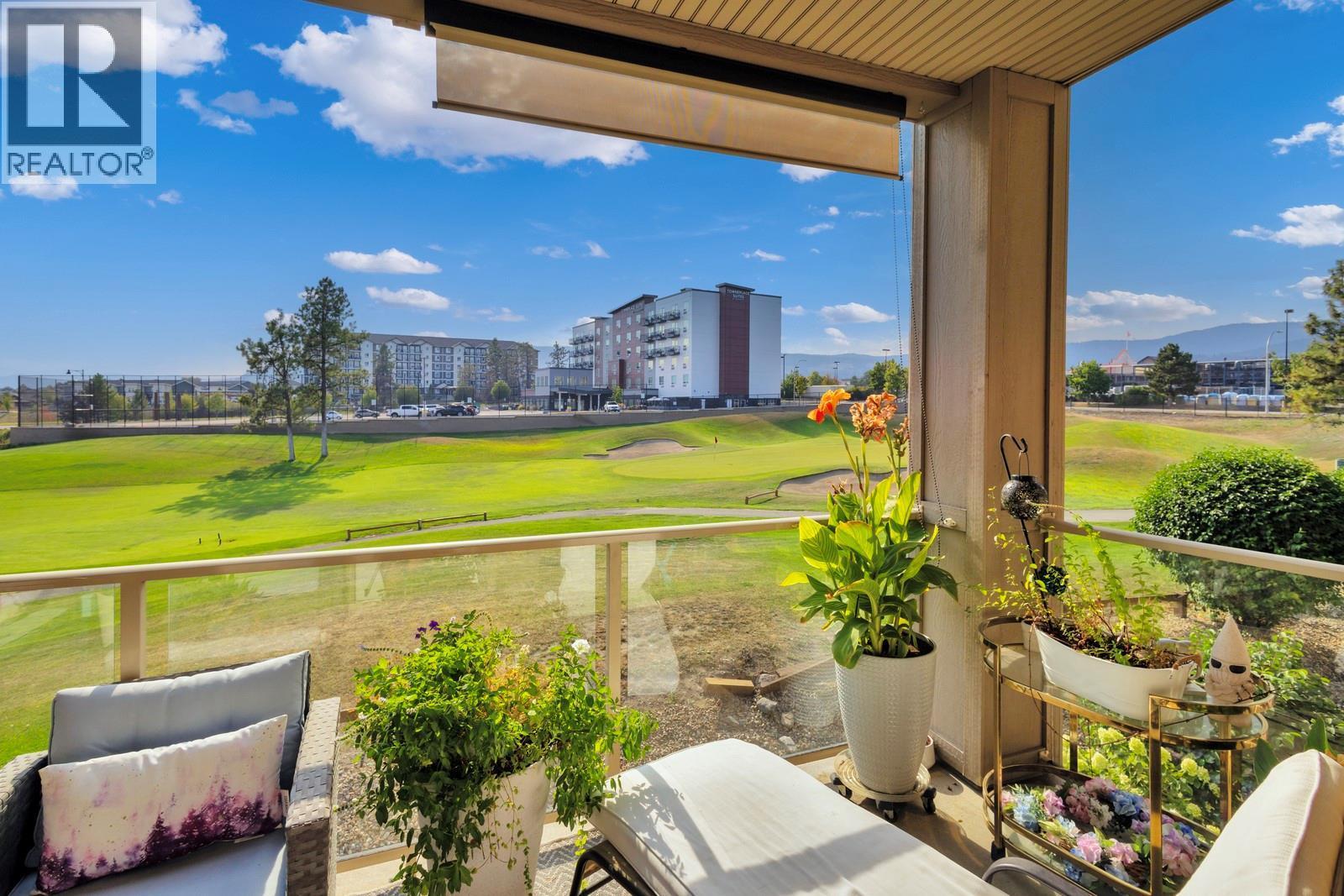 Second floor unit that looks out at the 8th hole - 3533 Carrington Road Unit# 211, Westbank, BC - Outdoor With Deck Patio Veranda With View