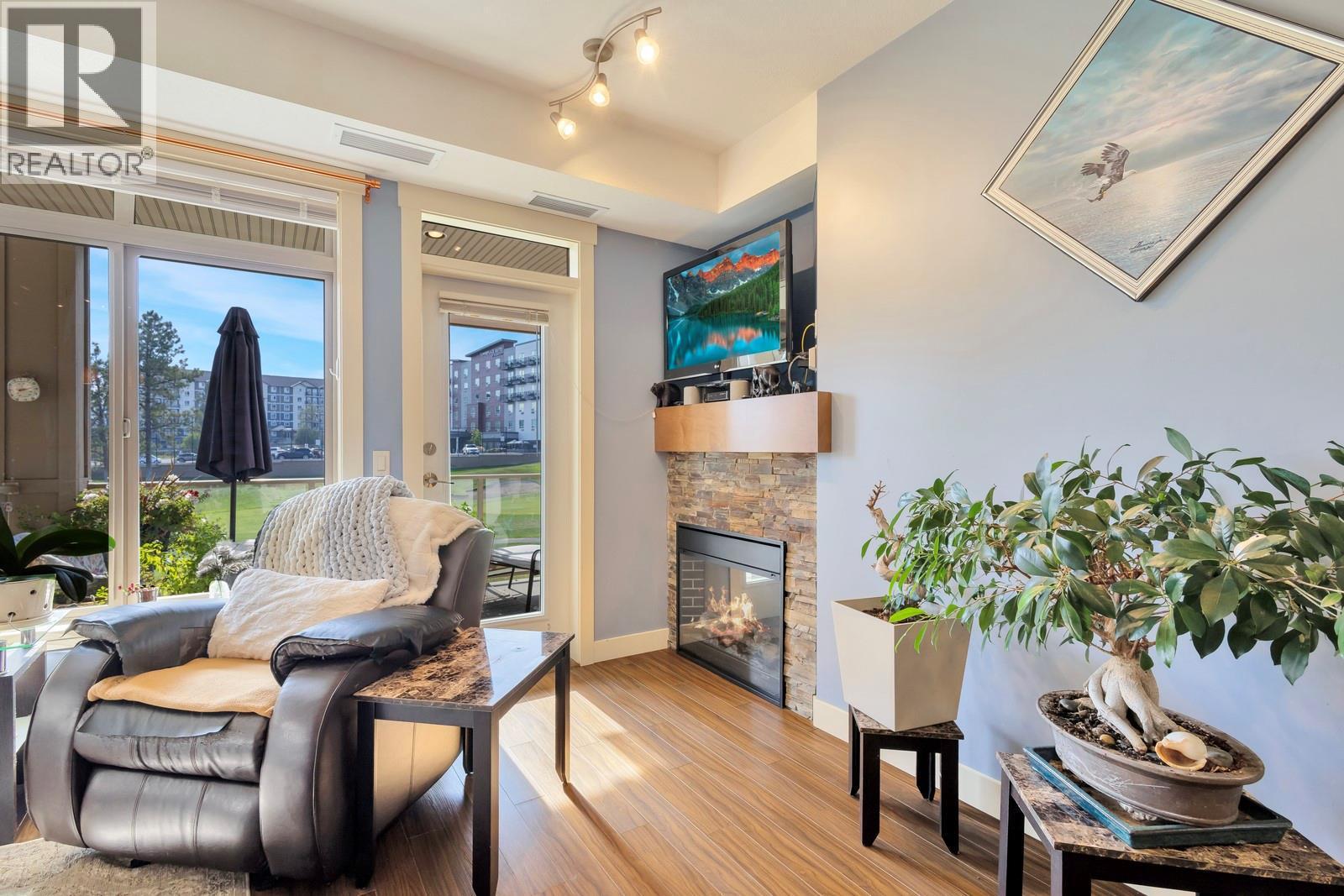 3533 Carrington Road Unit# 211, Westbank, BC - Indoor Photo Showing Living Room With Fireplace