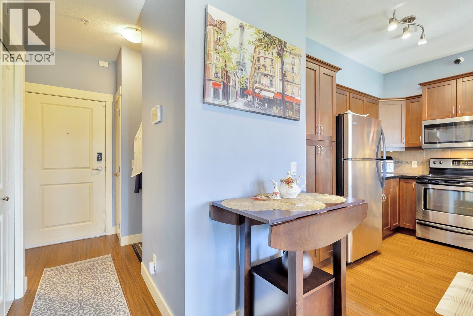 Den located behind the kitchen - 3533 Carrington Road Unit# 211, Westbank, BC - Indoor Photo Showing Kitchen