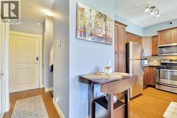 Den located behind the kitchen -