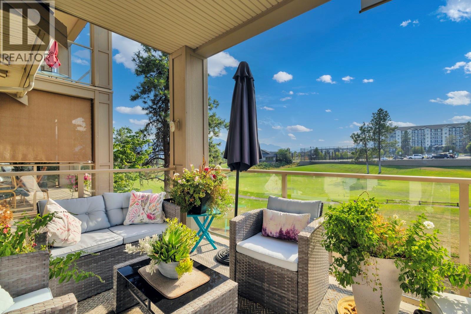 Large patio with space for furniture or outdoor cooking - 3533 Carrington Road Unit# 211, Westbank, BC - Outdoor With Deck Patio Veranda