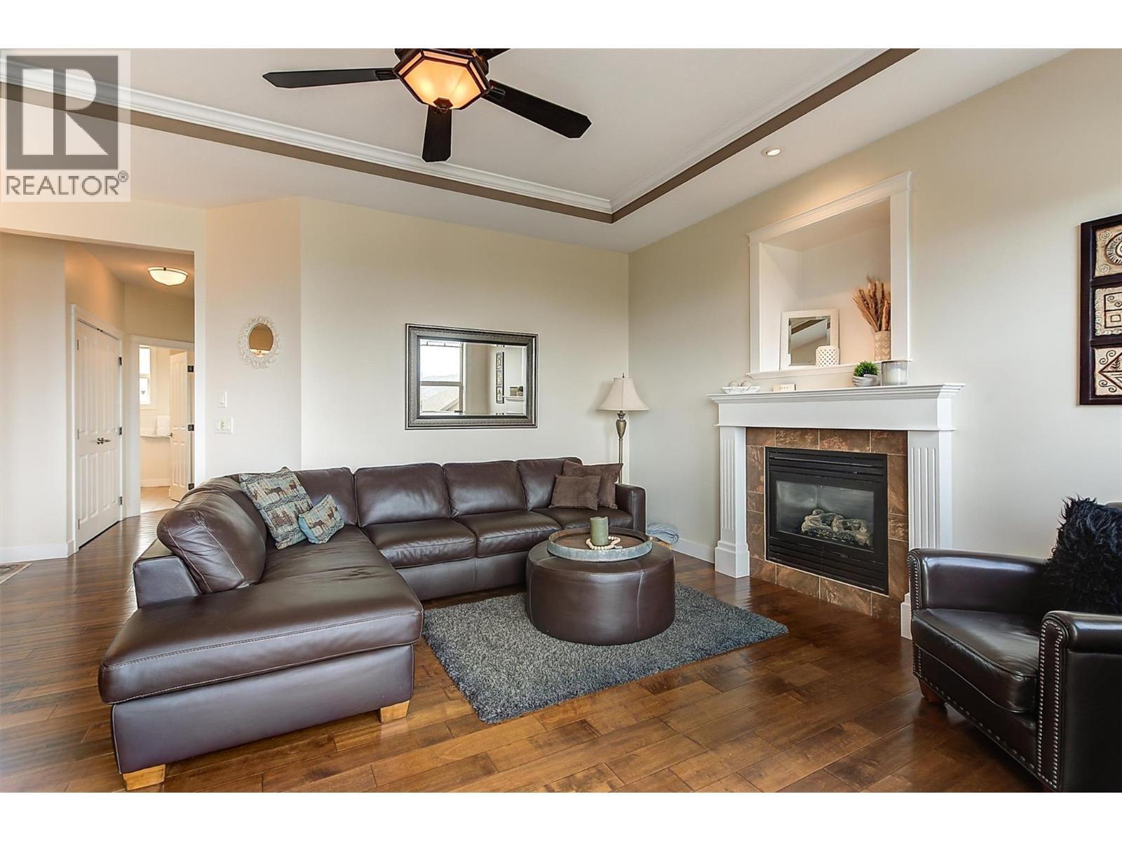 737 Kuipers Crescent, Kelowna, BC - Indoor Photo Showing Living Room With Fireplace