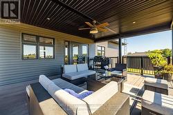 Covered back porch with BBQ -