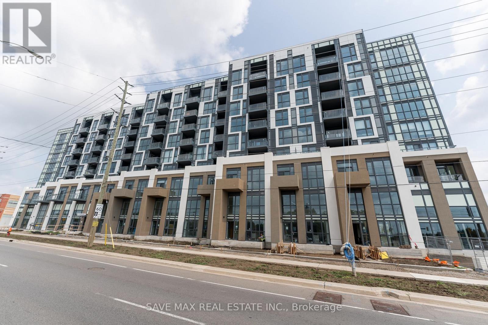205 - 509 Dundas Street W, Oakville, ON - Outdoor With Facade