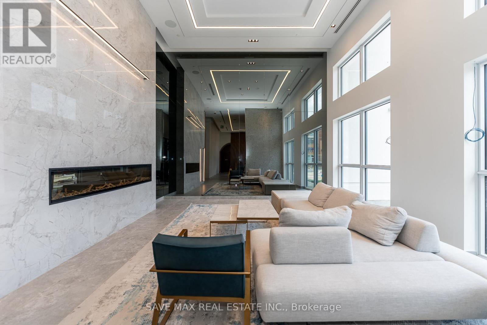 205 - 509 Dundas Street W, Oakville, ON - Indoor Photo Showing Living Room With Fireplace