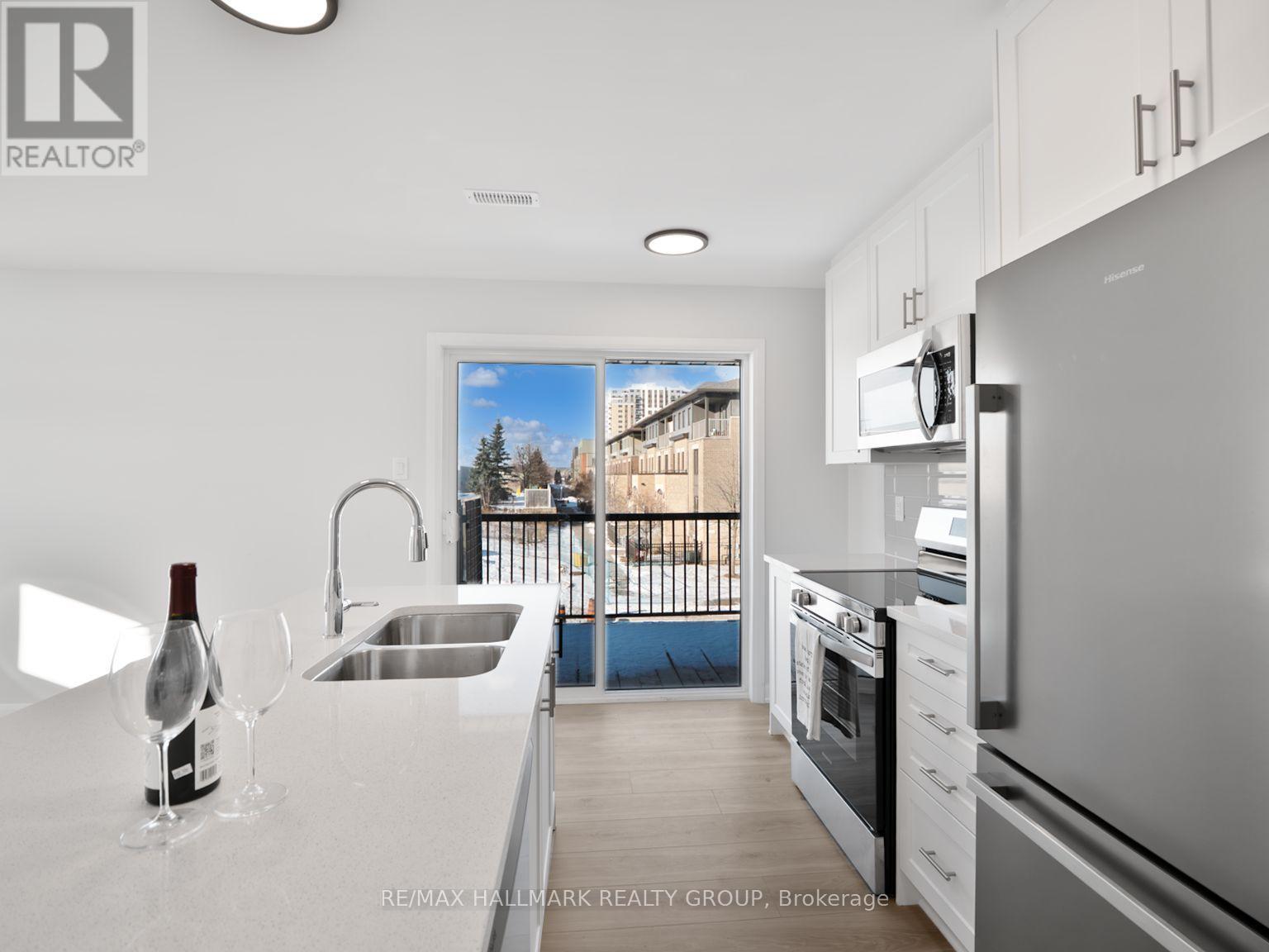 11 - 301 Glenroy Gilbert Drive, Ottawa, ON - Indoor Photo Showing Kitchen With Stainless Steel Kitchen With Double Sink With Upgraded Kitchen