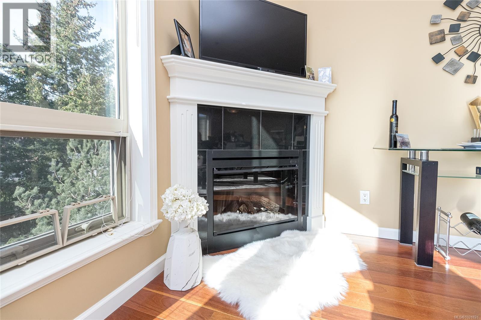 404 125 Aldersmith Pl, View Royal, BC - Indoor Photo Showing Other Room With Fireplace
