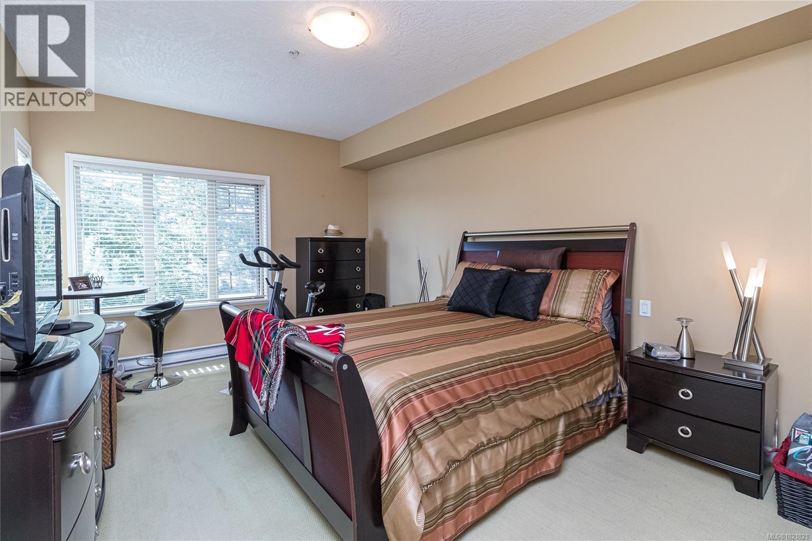 404 125 Aldersmith Pl, View Royal, BC - Indoor Photo Showing Bedroom