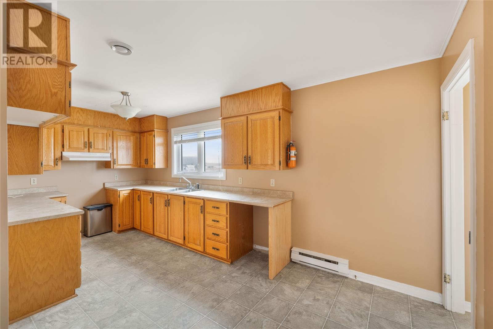 27 Ryans Lane, Trepassey, NL - Indoor Photo Showing Kitchen With Double Sink