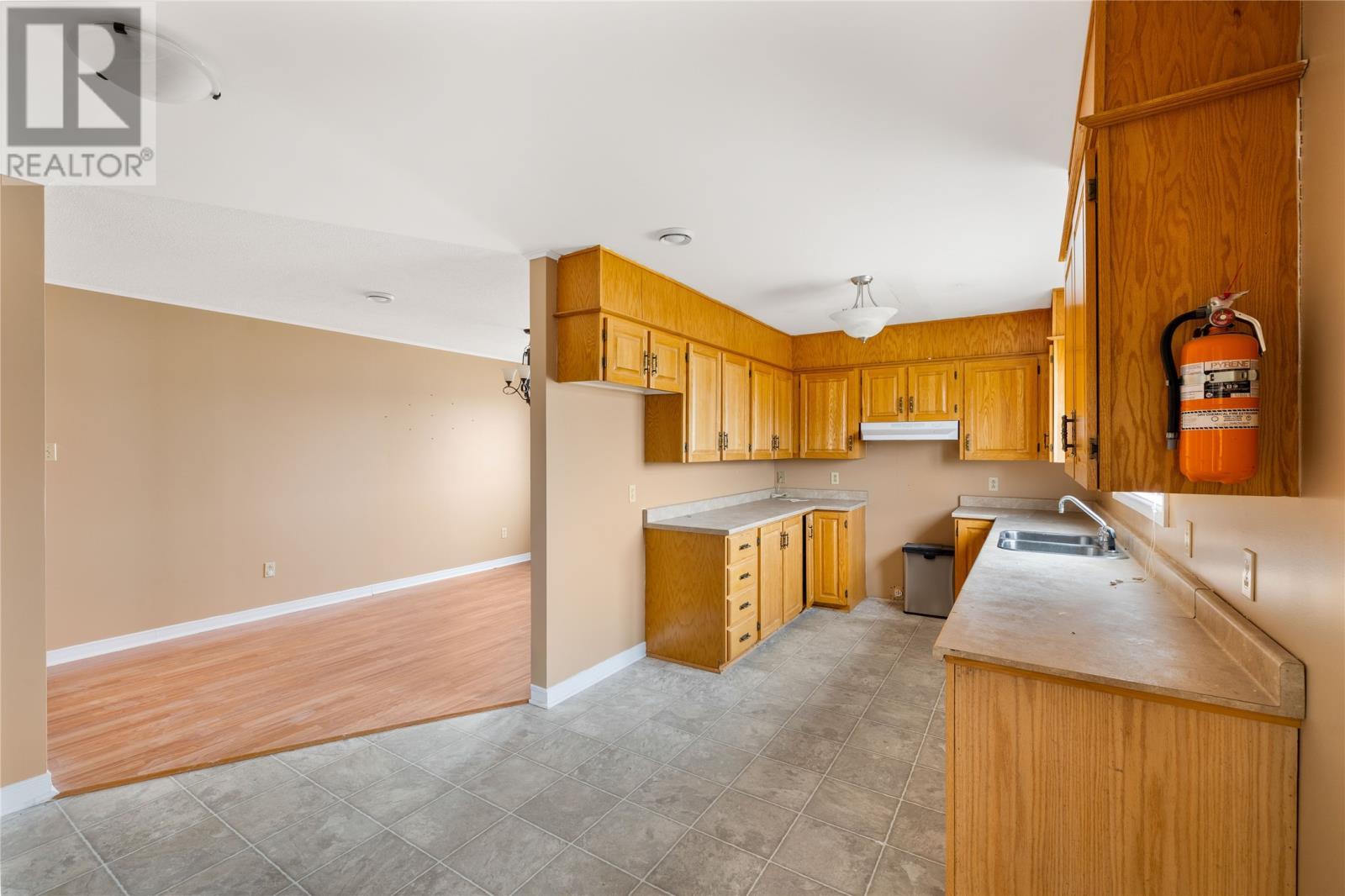 27 Ryans Lane, Trepassey, NL - Indoor Photo Showing Kitchen With Double Sink