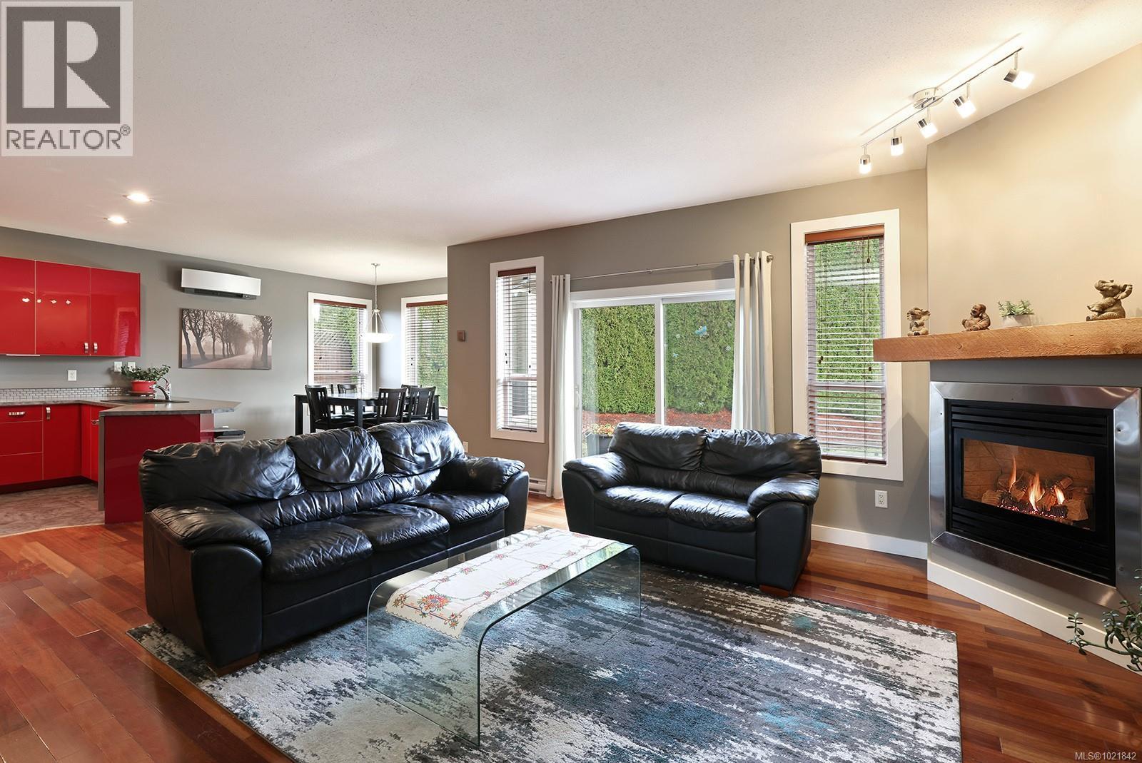 2228 Swallow Cres, Courtenay, BC - Indoor Photo Showing Living Room With Fireplace