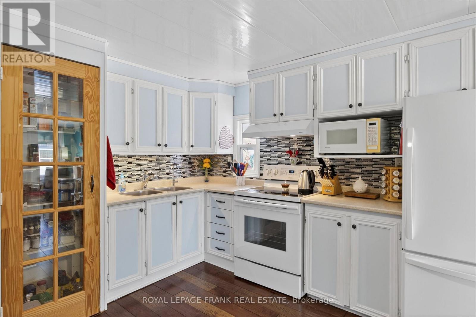 46B - 2244 Heritage Line, Otonabee-South Monaghan, ON - Indoor Photo Showing Kitchen With Double Sink