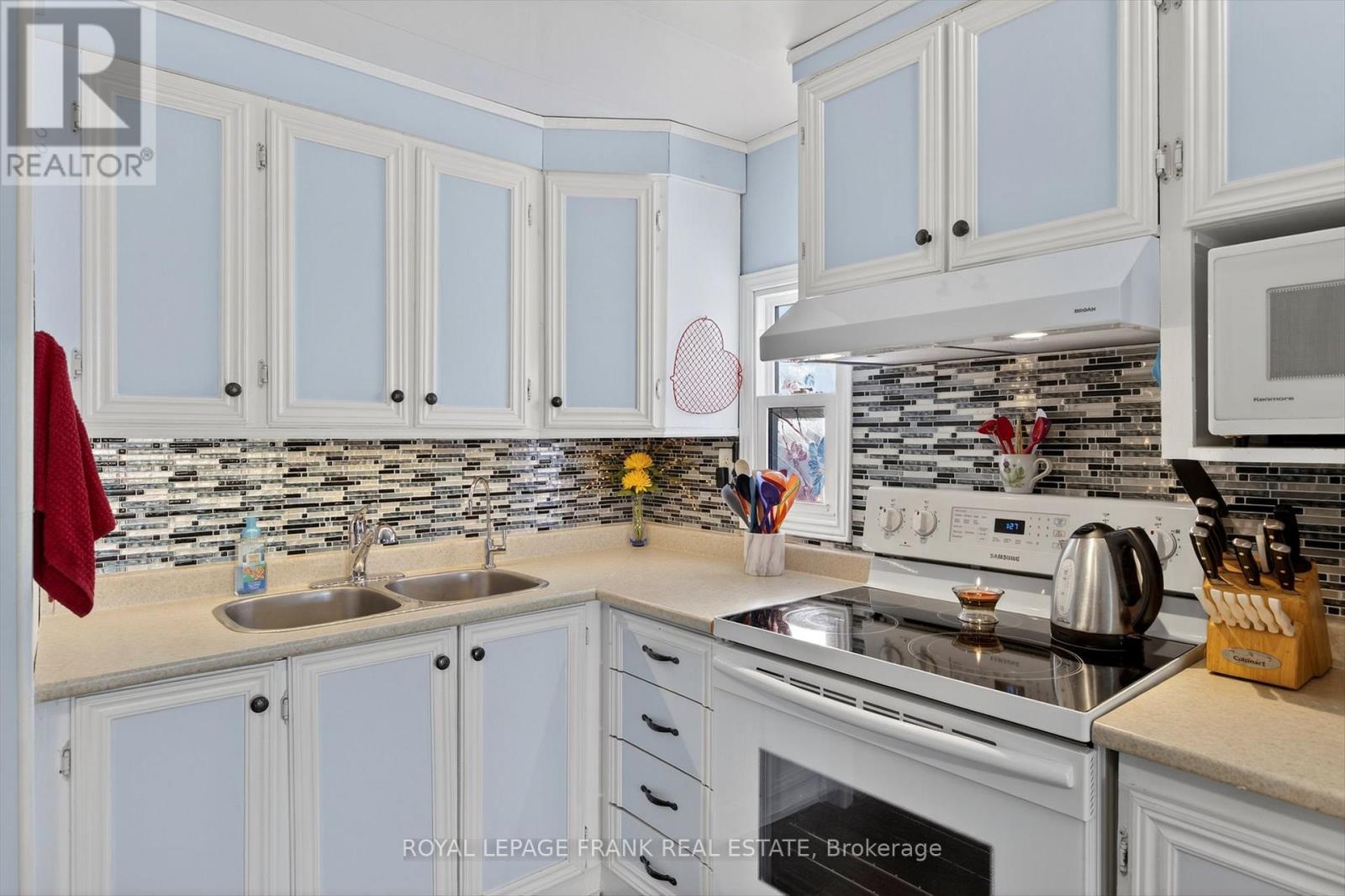 46B - 2244 Heritage Line, Otonabee-South Monaghan, ON - Indoor Photo Showing Kitchen With Double Sink