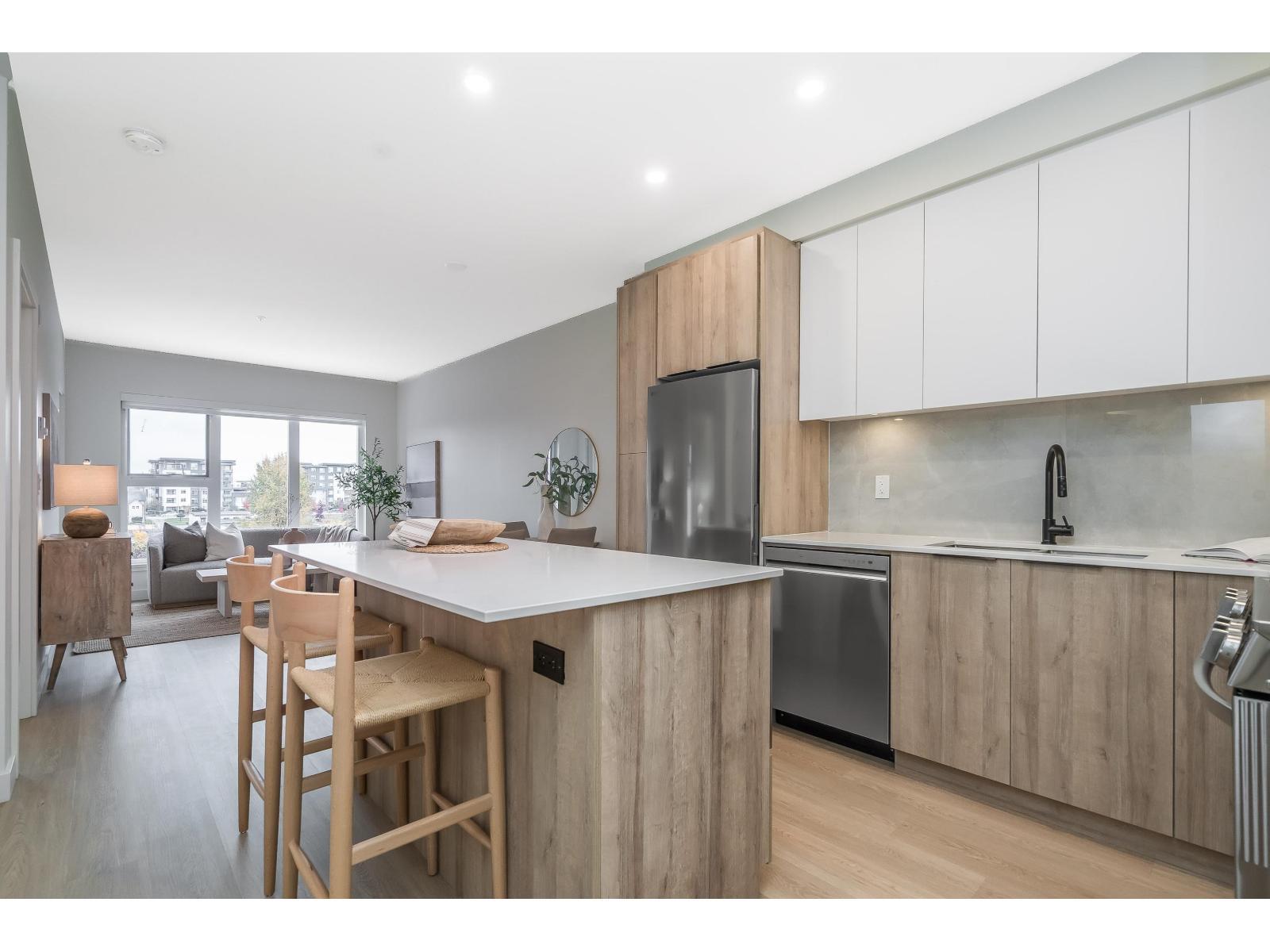 A411 7980 206A Street, Langley, BC - Indoor Photo Showing Kitchen With Upgraded Kitchen