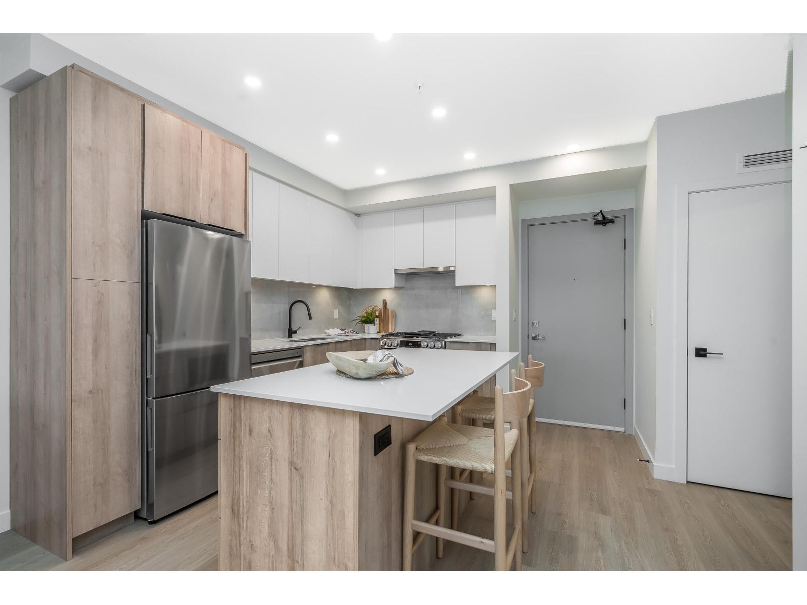 A411 7980 206A Street, Langley, BC - Indoor Photo Showing Kitchen With Upgraded Kitchen