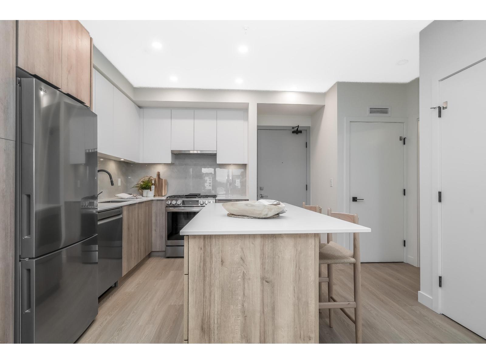 A411 7980 206A Street, Langley, BC - Indoor Photo Showing Kitchen With Upgraded Kitchen