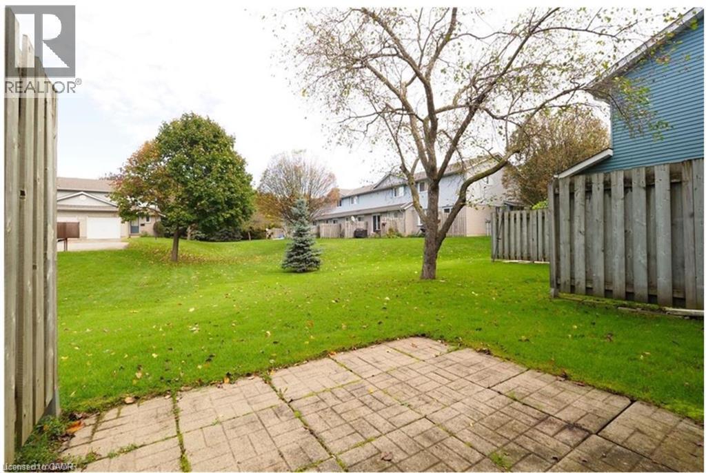 View of yard with a patio area - 455 Kingscourt Drive Unit# 3, Waterloo, ON - Outdoor