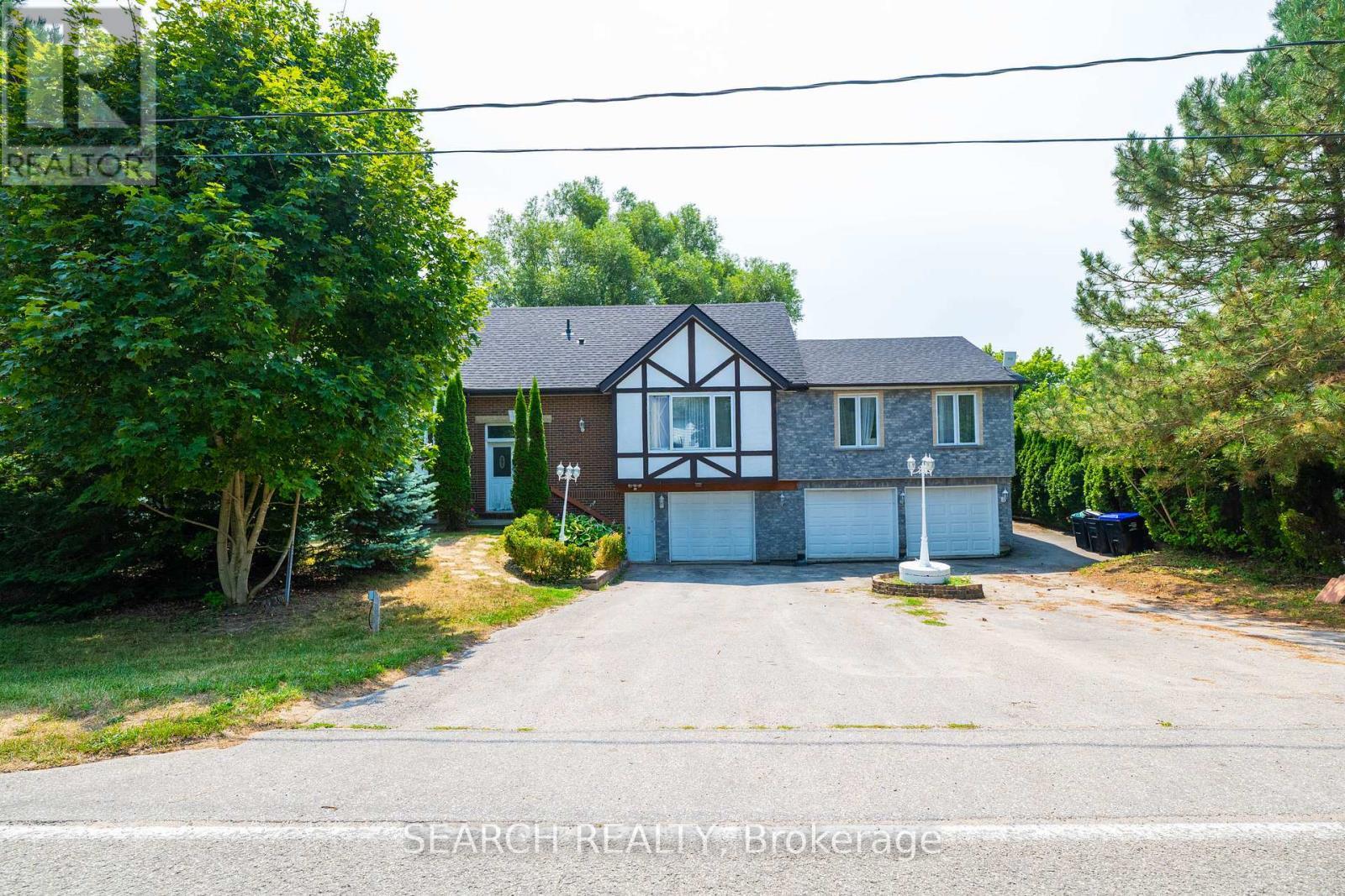 5127 10Th Side Road, Essa, ON - Outdoor With Facade