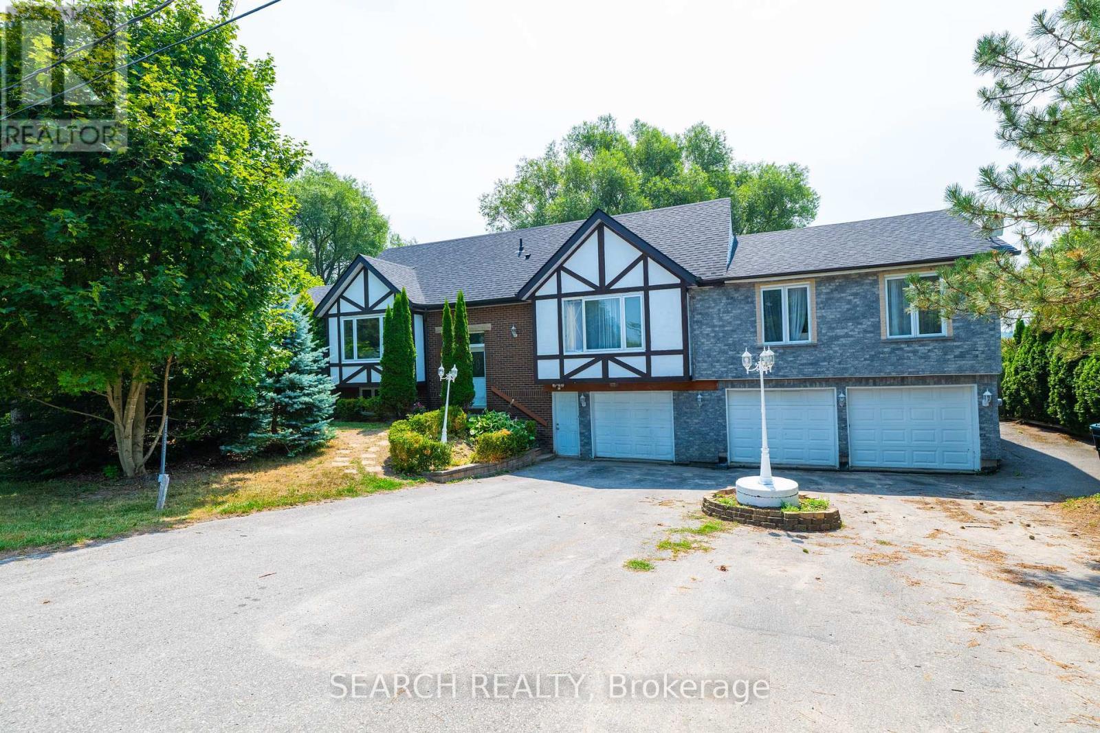 5127 10Th Side Road, Essa, ON - Outdoor With Facade