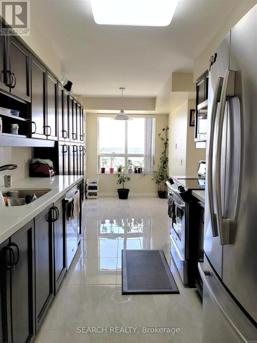 1625 - 25 Kingsbridge Garden Circle, Mississauga, ON - Indoor Photo Showing Kitchen With Double Sink