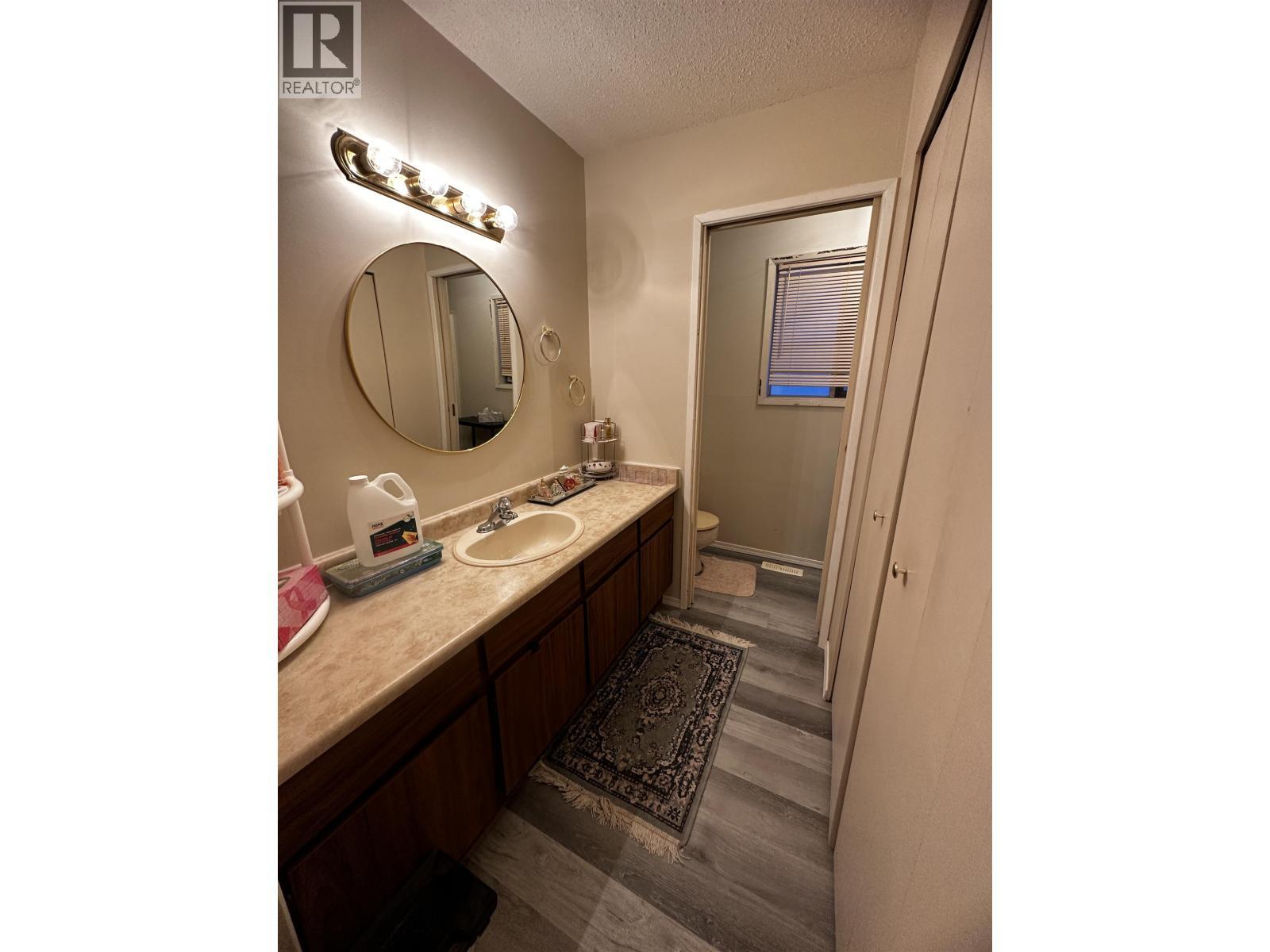 5735 Gairdner Crescent, Fort Nelson, BC - Indoor Photo Showing Bathroom