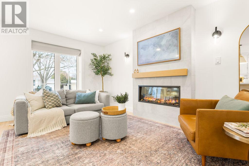 3356 Rexway Drive, Burlington, ON - Indoor Photo Showing Living Room With Fireplace