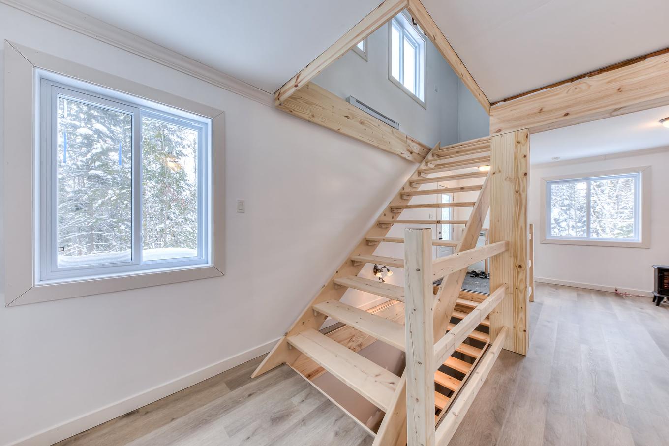Staircase - 101 Mtée Manitonga, Lac-Supérieur, QC - Indoor Photo Showing Other Room