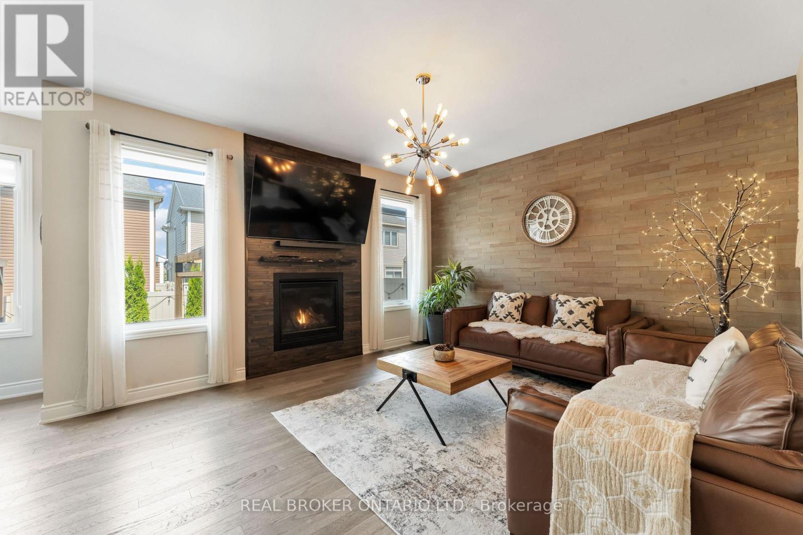 373 River Landing Avenue, Ottawa, ON - Indoor Photo Showing Living Room With Fireplace