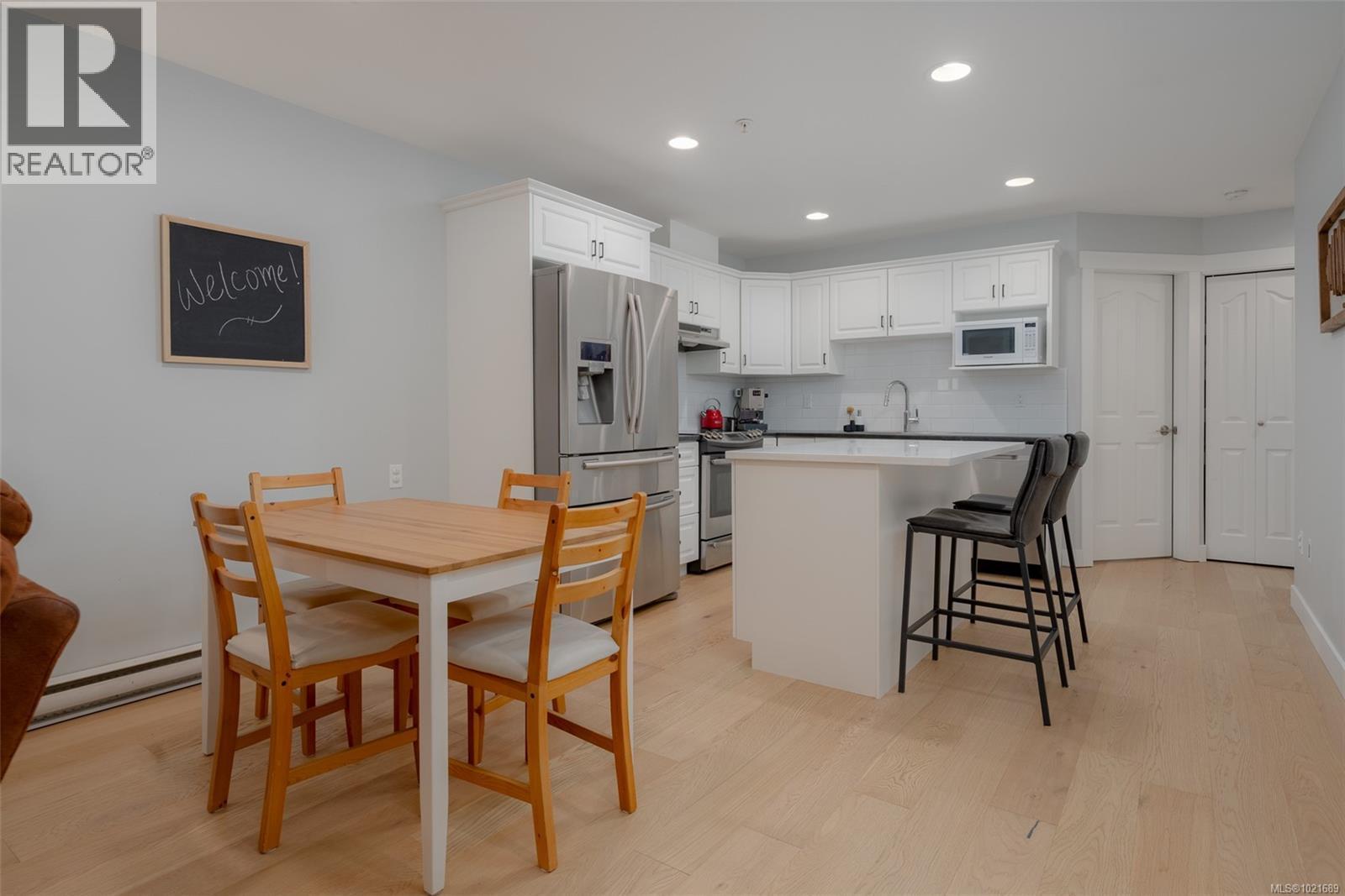 Kitchen and dining room. - 101 211 Victoria Rd, Nanaimo, BC