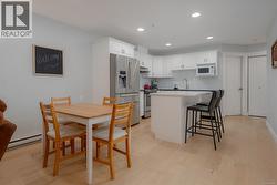 Kitchen and dining room. -