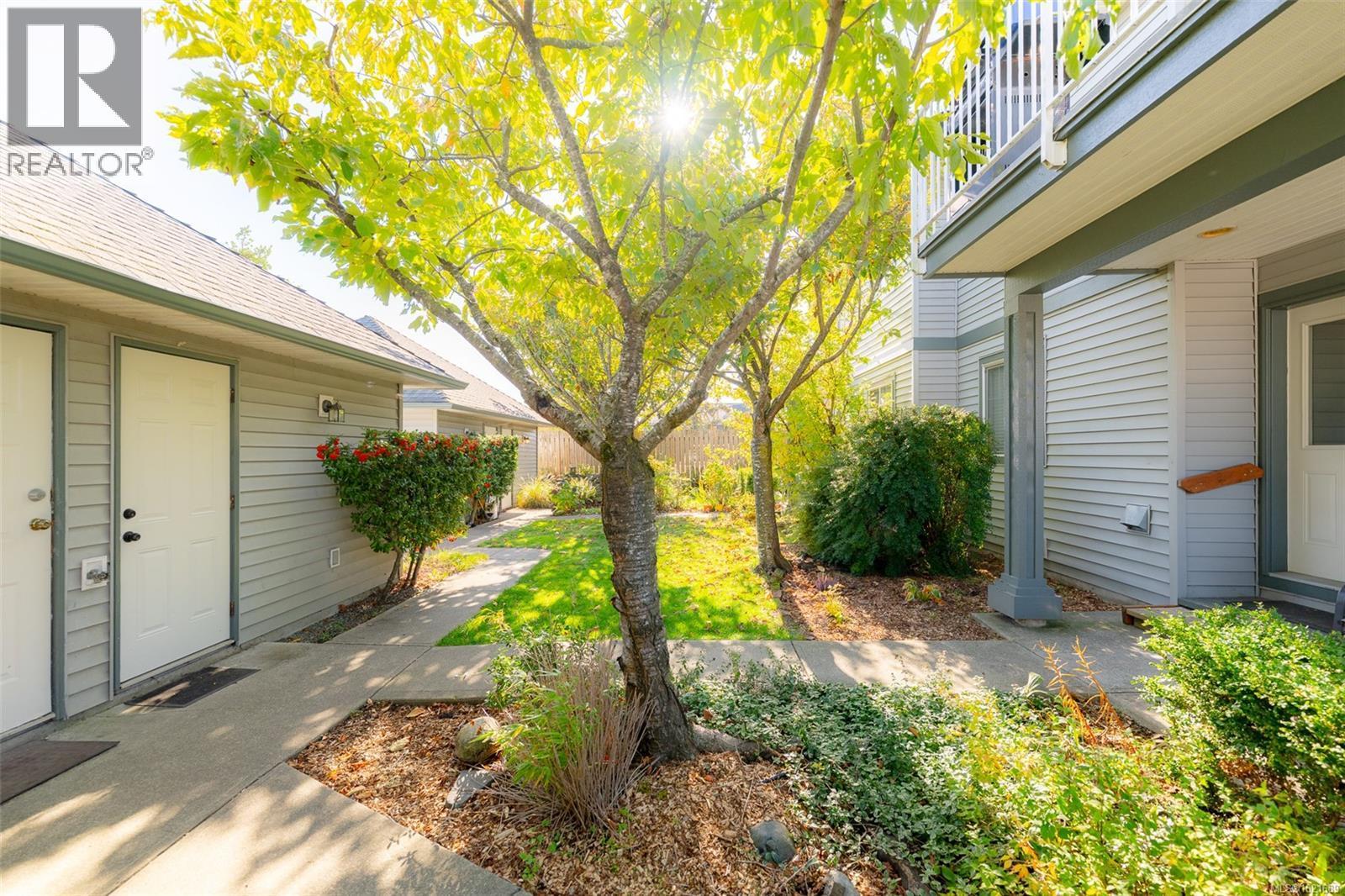 View of yard - 101 211 Victoria Rd, Nanaimo, BC