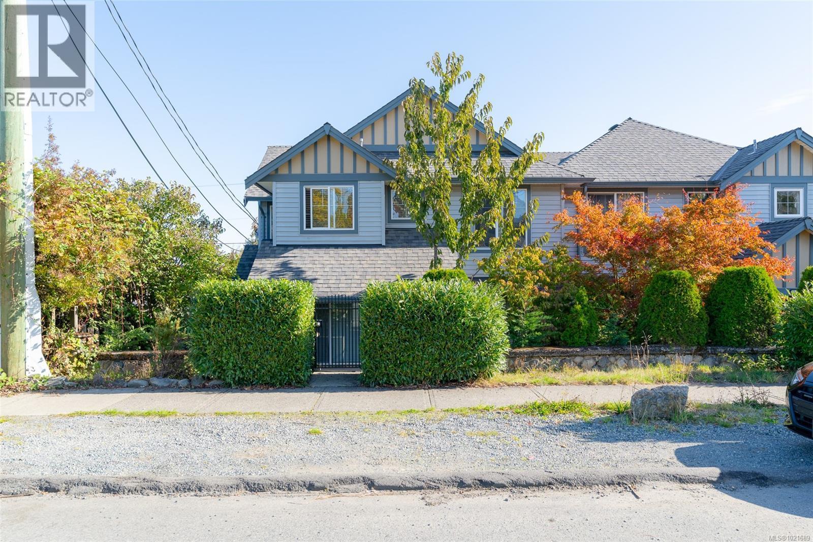 Front of property with locking gate - to main entrance - 101 211 Victoria Rd, Nanaimo, BC