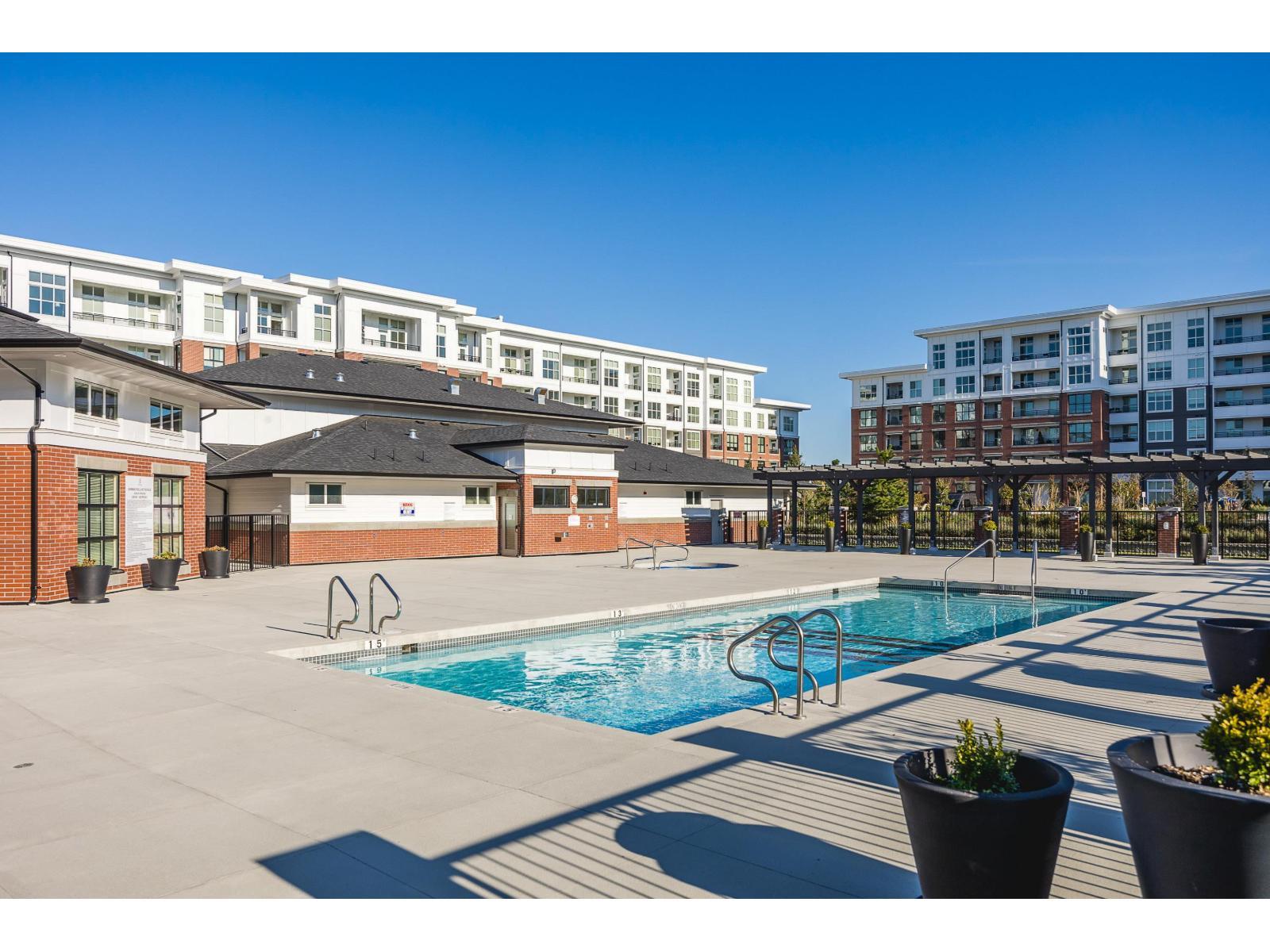 B116 8150 207 Street, Langley, BC - Outdoor With In Ground Pool