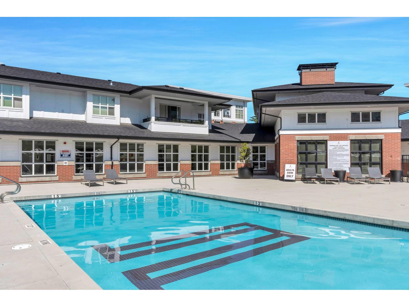 B116 8150 207 Street, Langley, BC - Outdoor With In Ground Pool