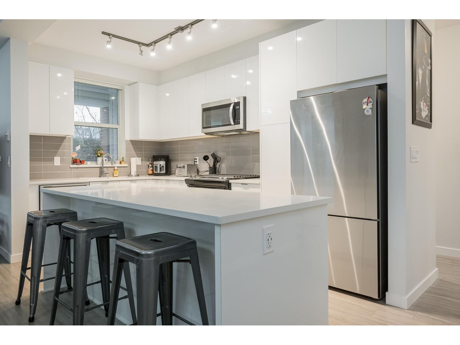 B116 8150 207 Street, Langley, BC - Indoor Photo Showing Kitchen With Upgraded Kitchen