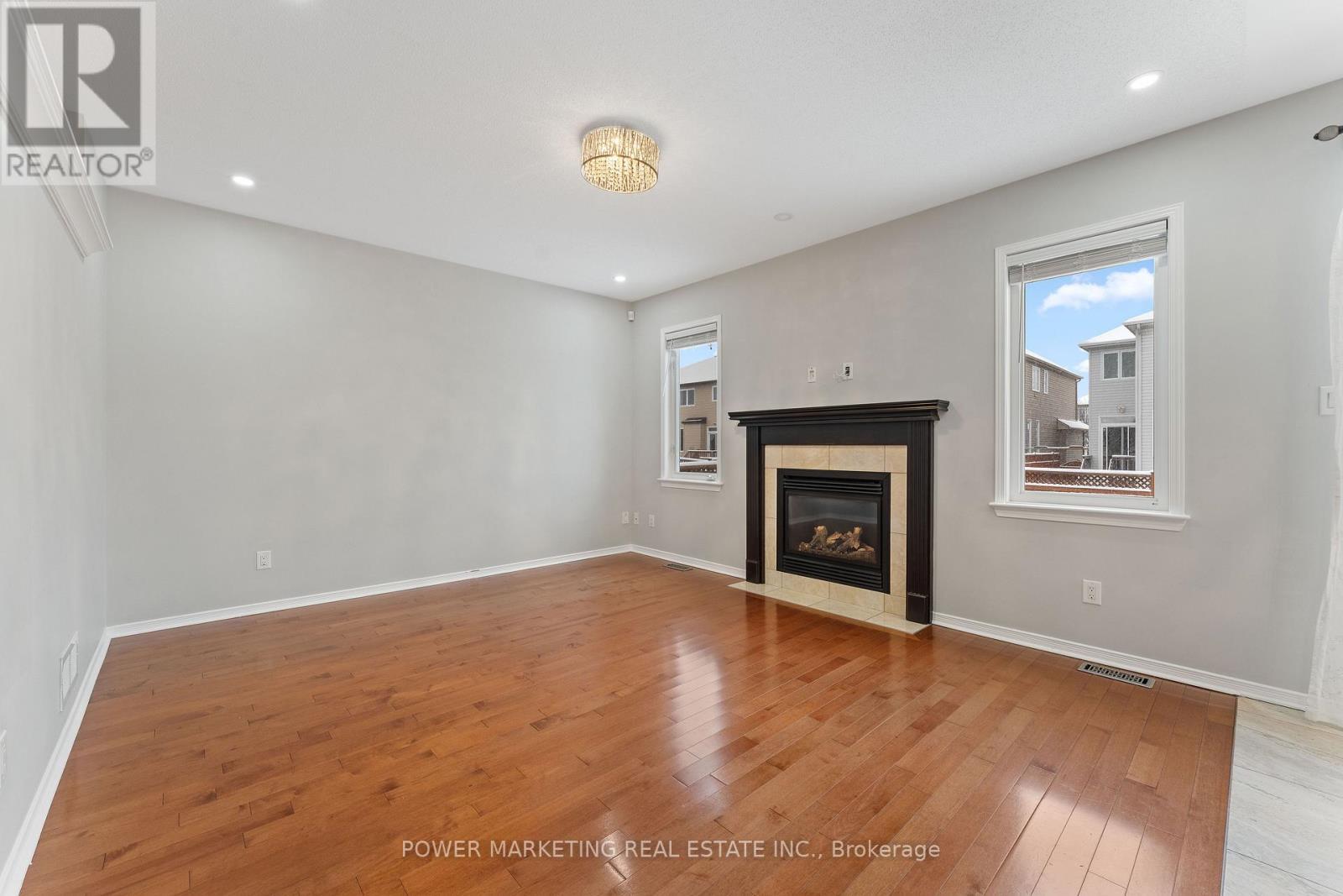 224 Harthill Way, Ottawa, ON - Indoor Photo Showing Living Room With Fireplace