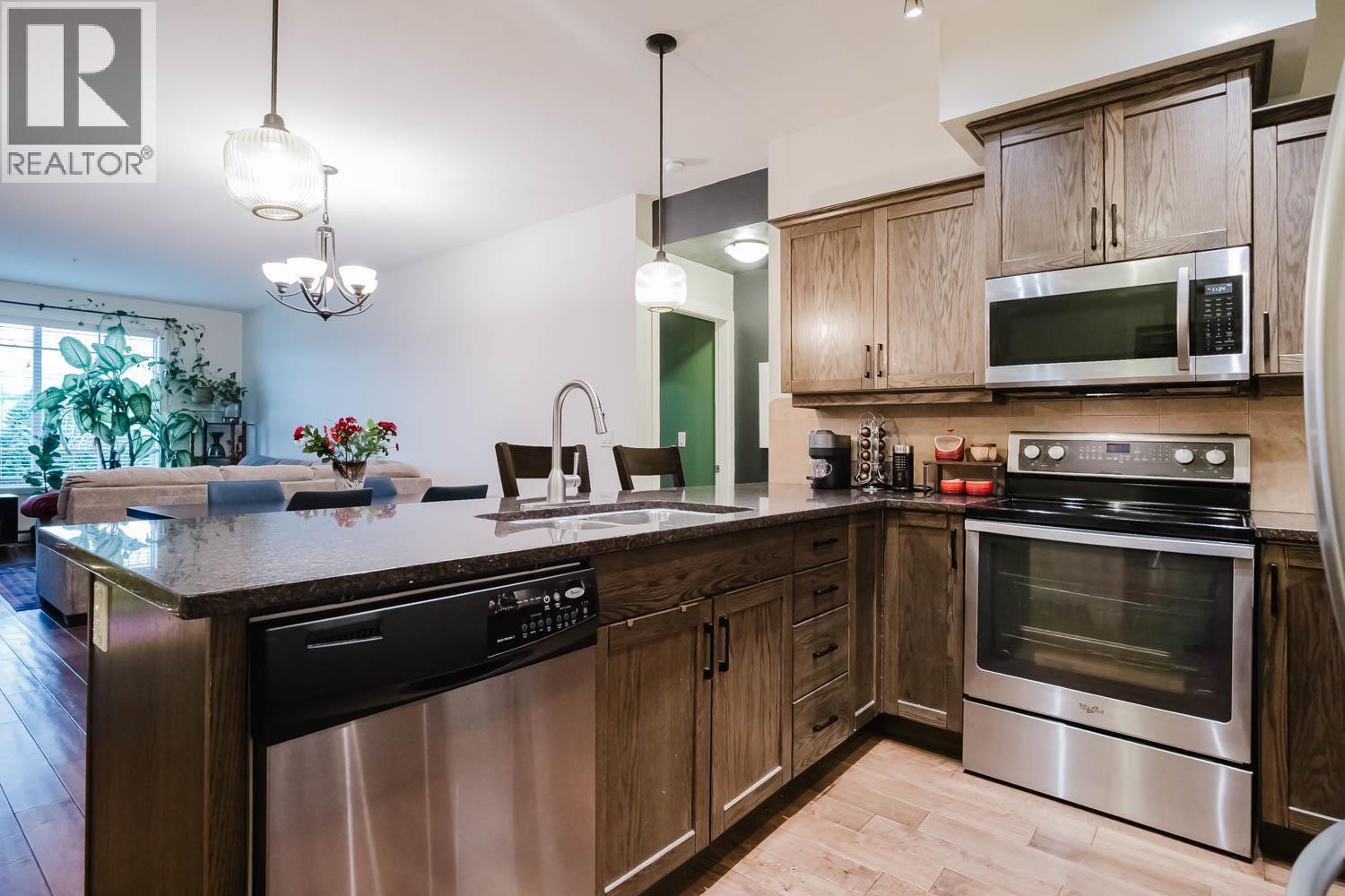 3739 Casorso Road Unit# 112, Kelowna, BC - Indoor Photo Showing Kitchen With Stainless Steel Kitchen With Double Sink