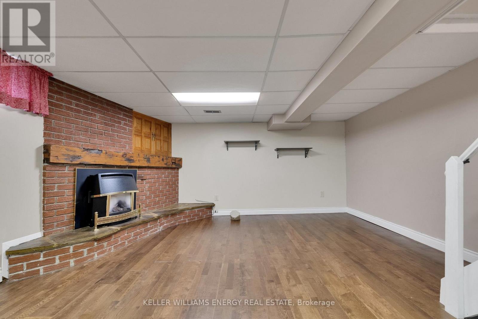 242 Waverly Street S, Oshawa (Vanier), ON - Indoor Photo Showing Basement With Fireplace