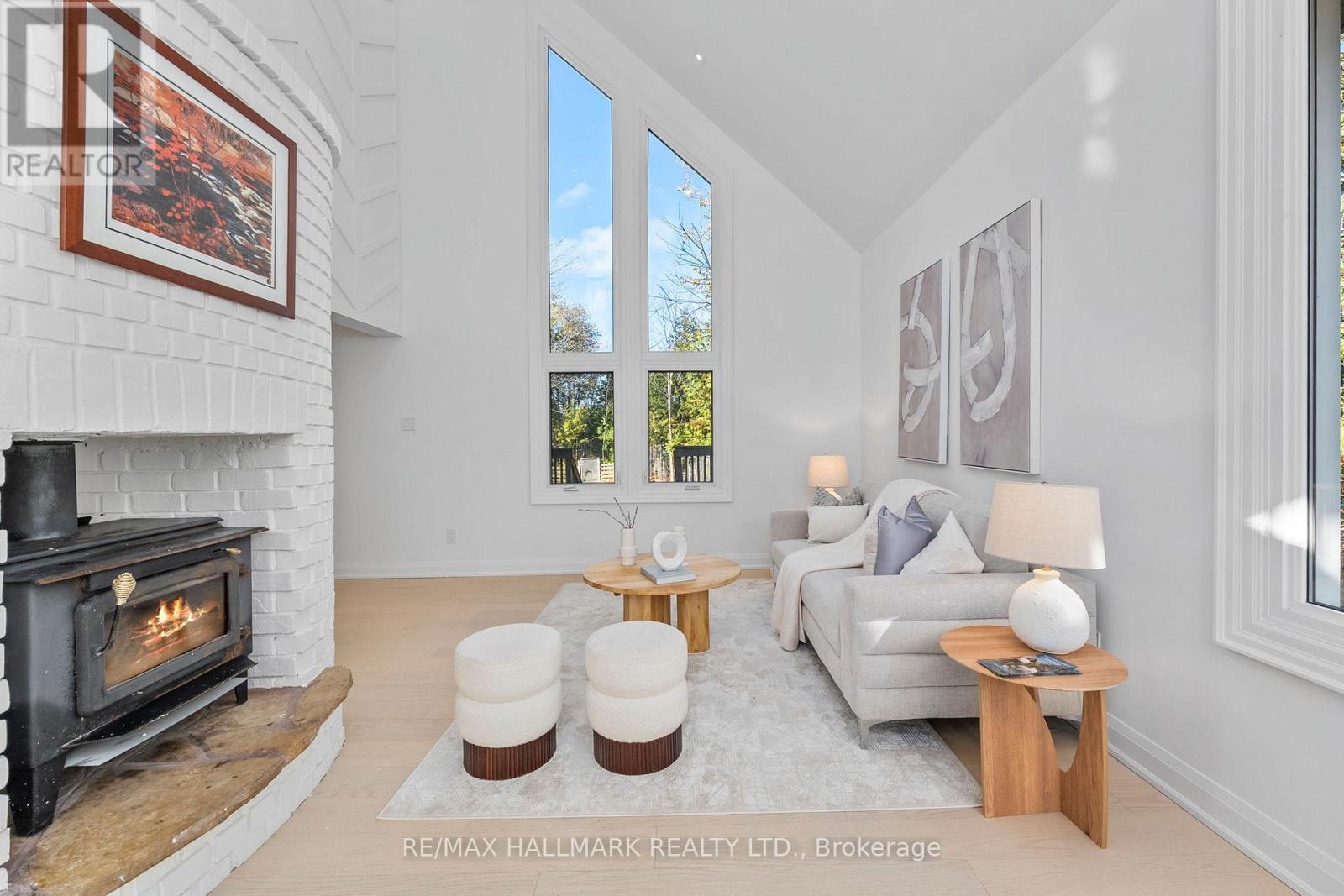 3716 Maple Grove Road, Innisfil, ON - Indoor Photo Showing Living Room With Fireplace