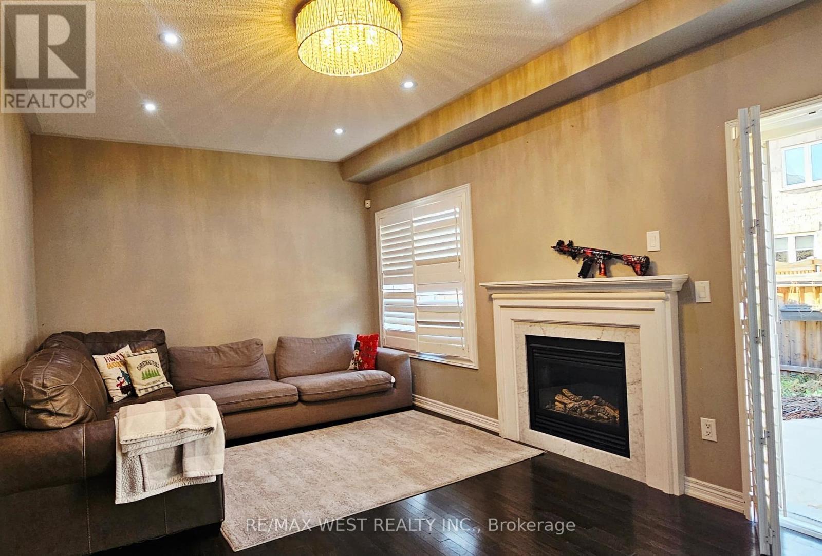 38 Wasaga Road, Brampton, ON - Indoor Photo Showing Living Room With Fireplace