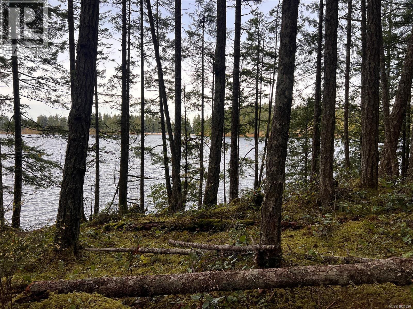 View of Lake from trail. - 3126 Elsie Lake Cir, Nanaimo, BC